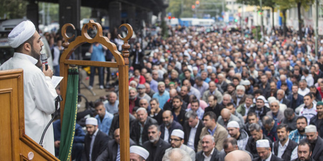 Muslims perform Friday prayers on Skalitzer Strsse in Berlin