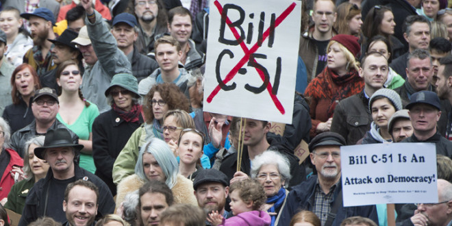 Demonstrators attend a protest on a national day of action against Bill C-51, the government's proposed anti-terrorism legislation, outside the Vancouver Art Gallery in downtown Vancouver, Saturday, March 14, 2015.